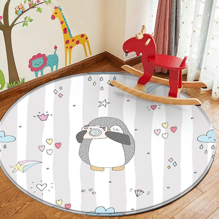 Rund barnmatta med pingvin och kamera