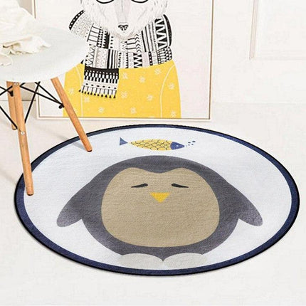 Oval barnmatta med söt pingvin