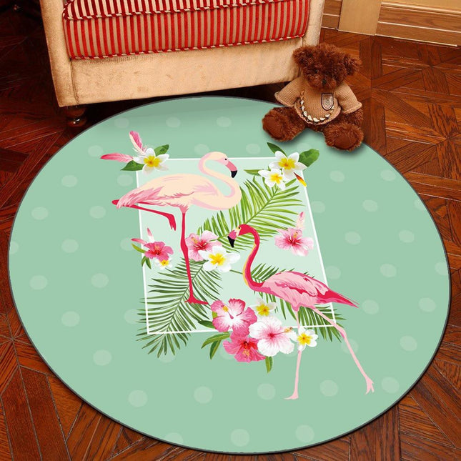 Rund matta med flamingos och blommor