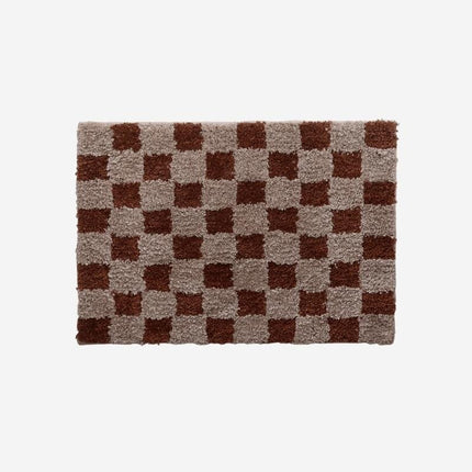 Mjuk dörrmatta med rutigt vintagemönster