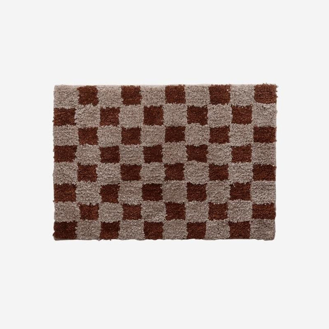 Mjuk dörrmatta med rutigt vintagemönster