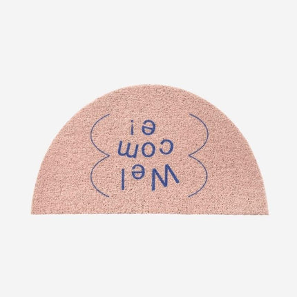 Halvmåneformad dörrmatta med 'Welcome' text