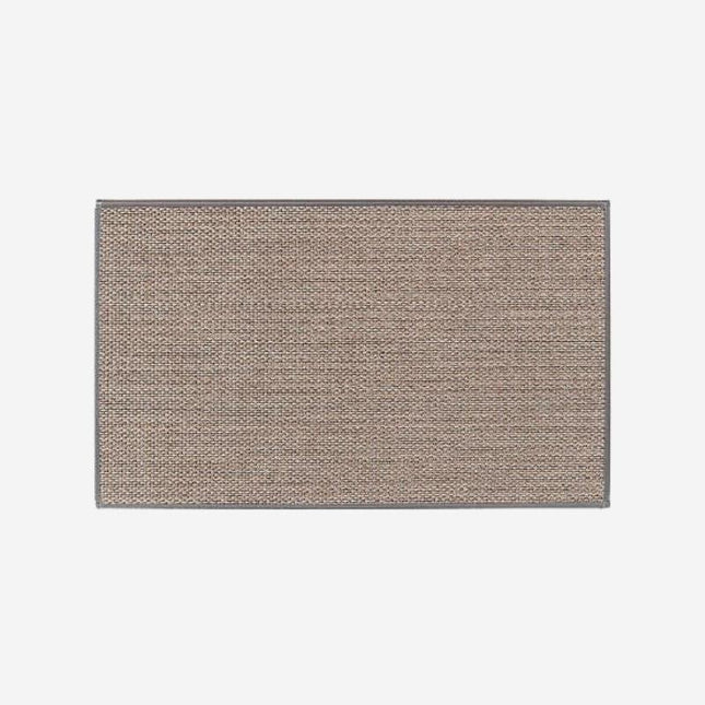 Absorberande entrématta för hallen