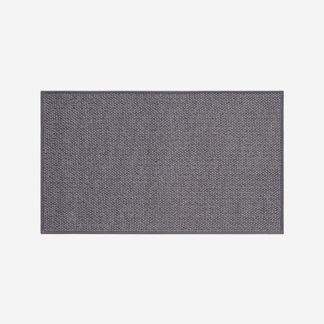 Absorberande entrématta för hallen