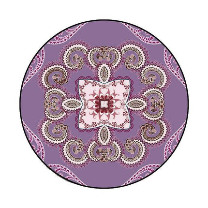 Stor rund lila matta med mönster
