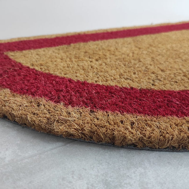 Halvmåneformad dörrmatta i kokos