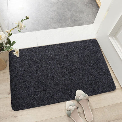 Enkel svart dörrmatta för entrén