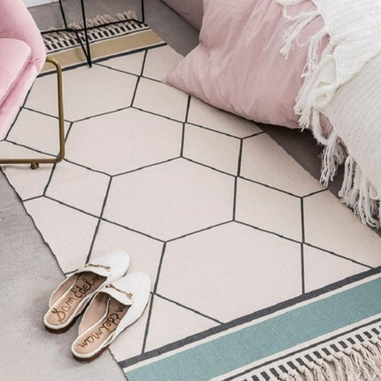 Liten designmatta med geometriskt mönster