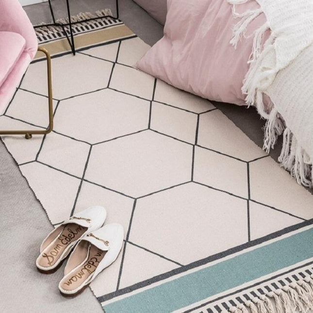 Liten designmatta med geometriskt mönster