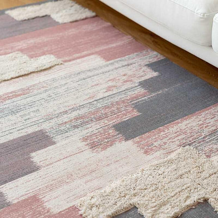 Liten rosa matta med fransar