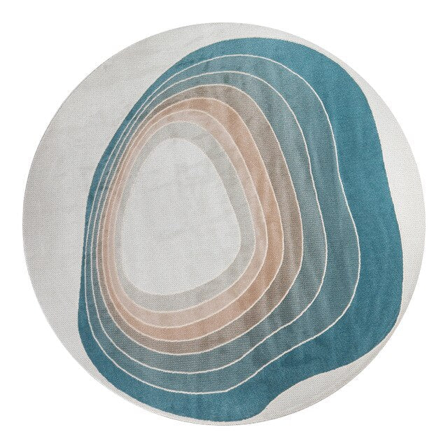 Rund blå och beige designmatta