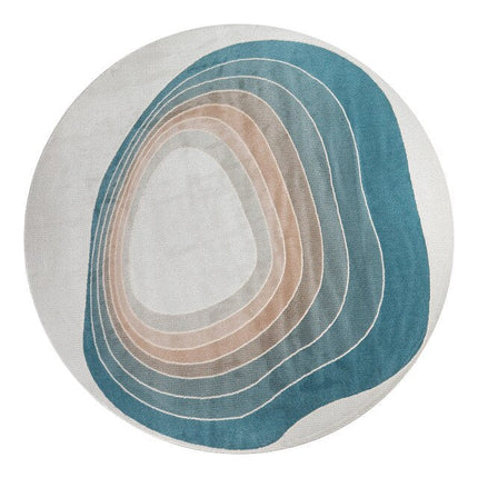 Rund blå och beige designmatta