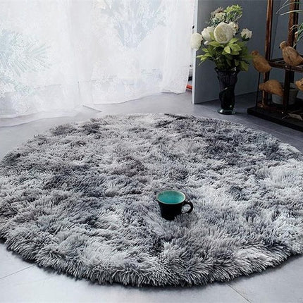 Rund mjuk ljusgrå shaggymatta