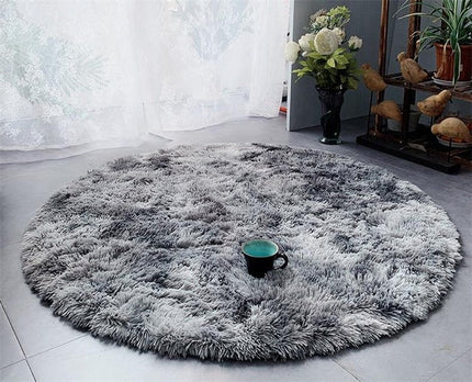 Rund mjuk ljusgrå shaggymatta