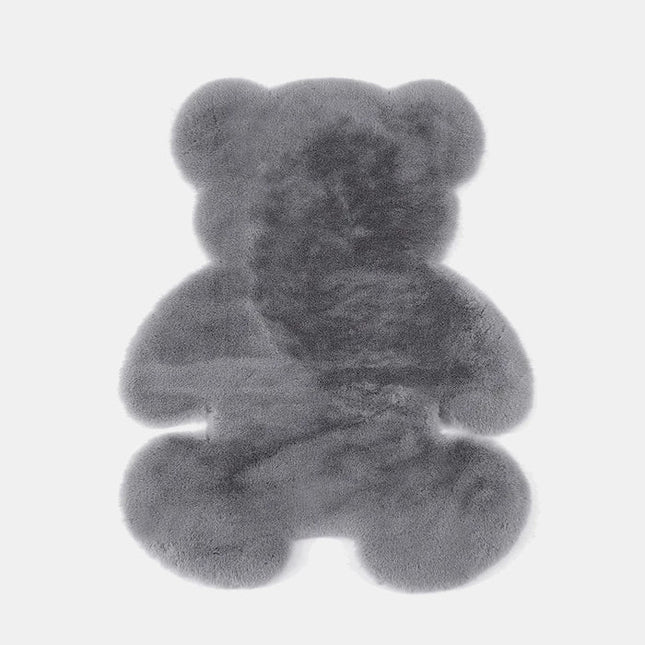 Mörkgrå nallebjörnsmatta i mjuk fuskpäls