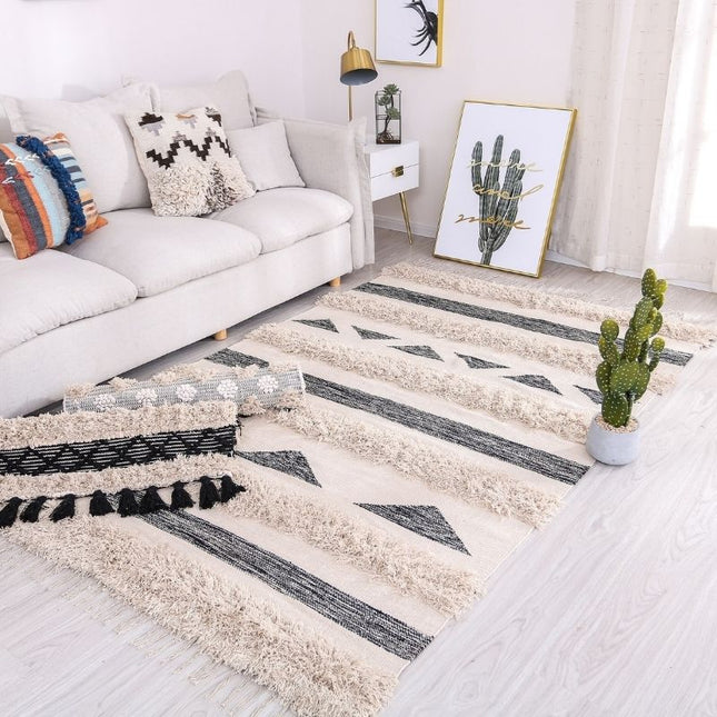 Bohemisk berbermatta med tofsar och struktur