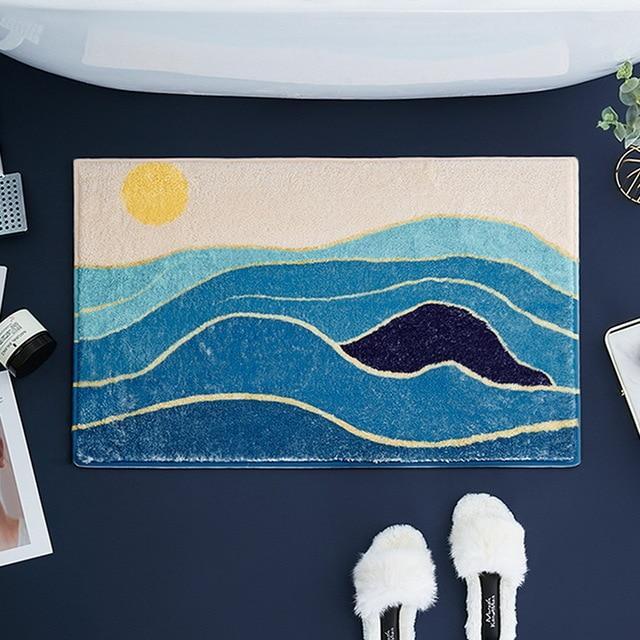 Badrumsmatta med motiv av havet
