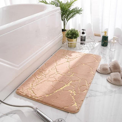 Badrumsmatta i roséguld med marmor