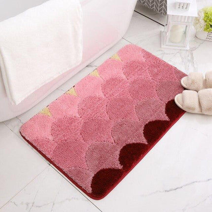 Mjuk badrumsmatta i rött och rosa