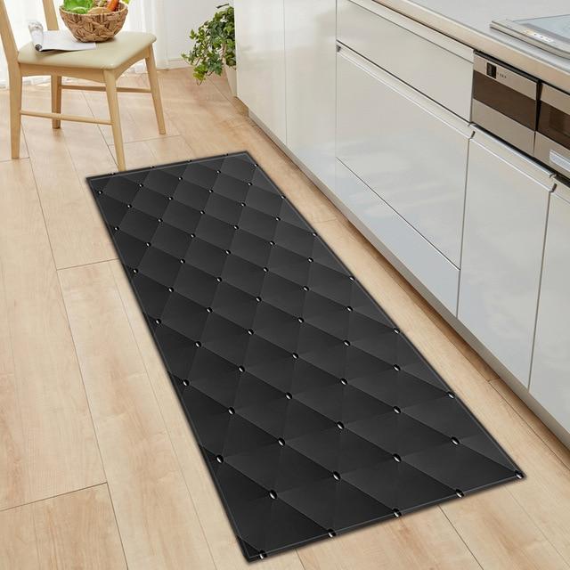 Svart köksmatta med geometriskt 3D-mönster