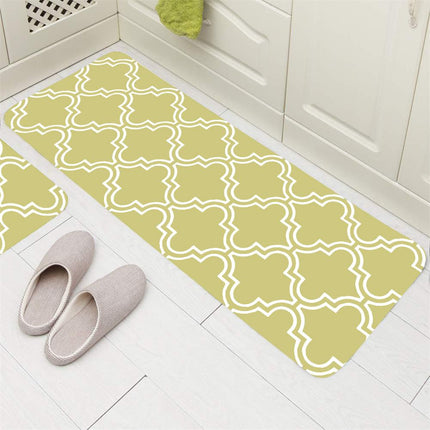 Anisgrön köksmatta med ljust mönster