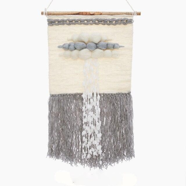 Vävd väggbonad med molnmotiv