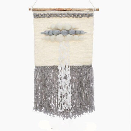 Vävd väggbonad med molnmotiv