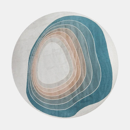 Rund blå och beige designmatta