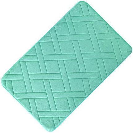 Turkosblå badrumsmatta med geometriskt mönster