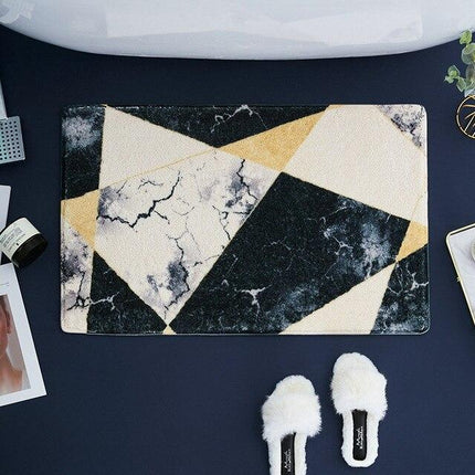 Badrumsmatta med geometrisk marmordesign