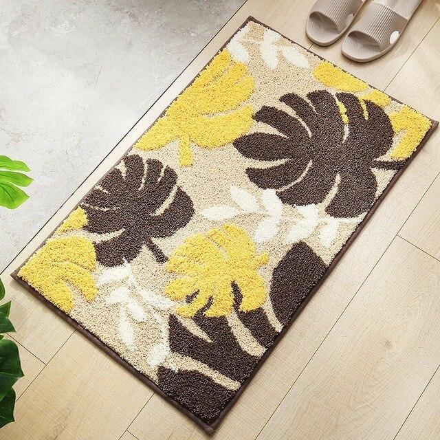 Badrumsmatta med tropiska löv motiv