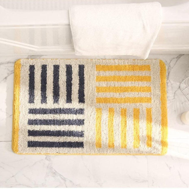 Mjuk gul badrumsmatta med ränder