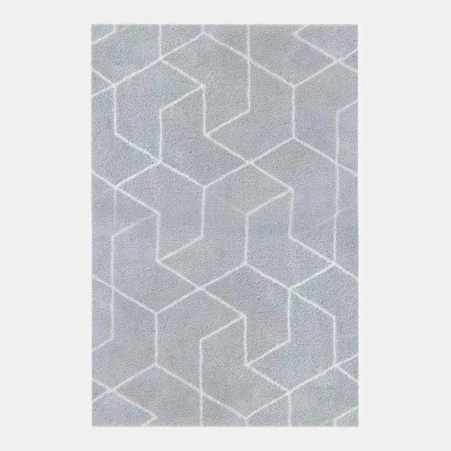 Grå shaggymatta med geometriskt mönster