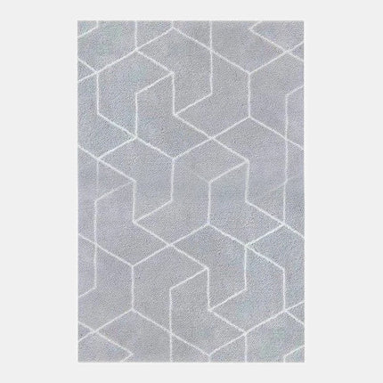 Grå shaggymatta med geometriskt mönster