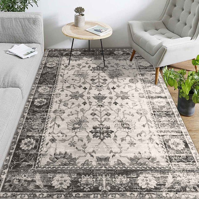 Vintage matta i grått och vitt